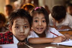 Burmese children in Mandalay with Thanaka sunscreen