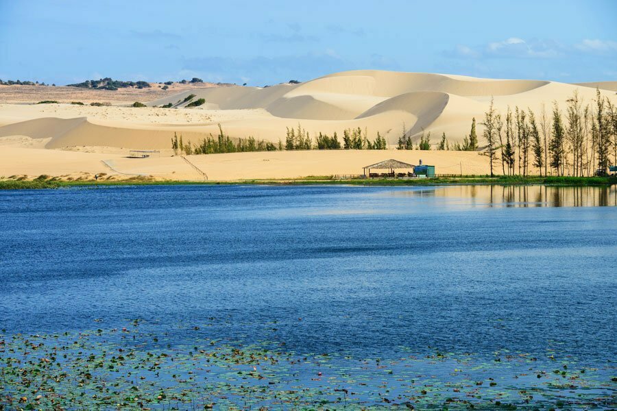 View of Muine sand dunes and blue water