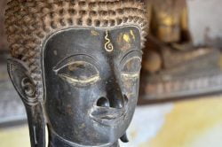 Buddha statue at Wat Si Saket in Vientiane (Laos family adventure with Hanoi Voyages)