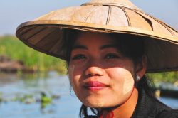 A Burmese woman with sunscreen on her face
