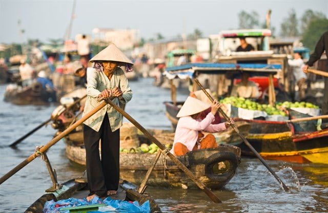 Cai Be floating village in Mekong Delta - Vietnam-Laos-Cambodia tour with Hanoi Voyages