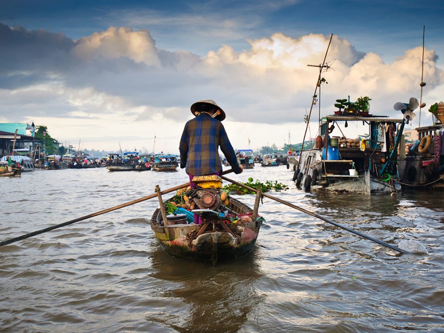 Floating market in the Mekong Delta - Essential Vietnam tour