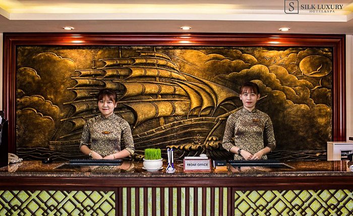 silk luxury hotel receptionist