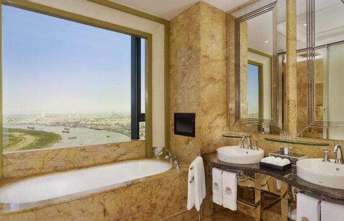 Bathroom with a view in Reverie Saigon