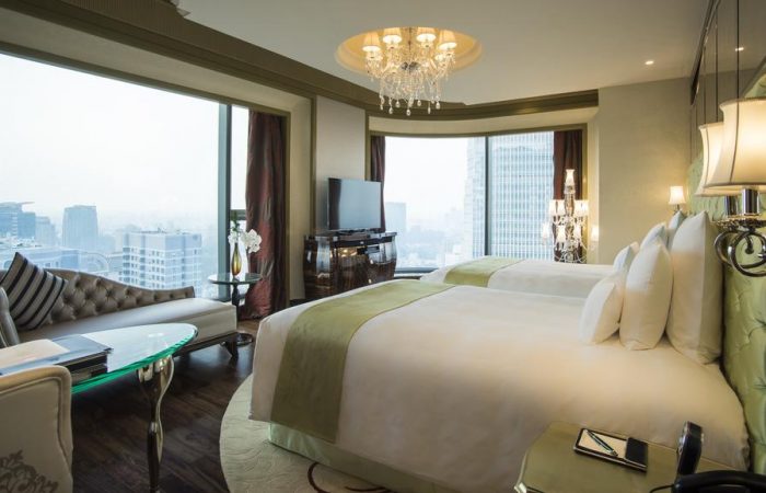 Bed with a view in Reverie Saigon