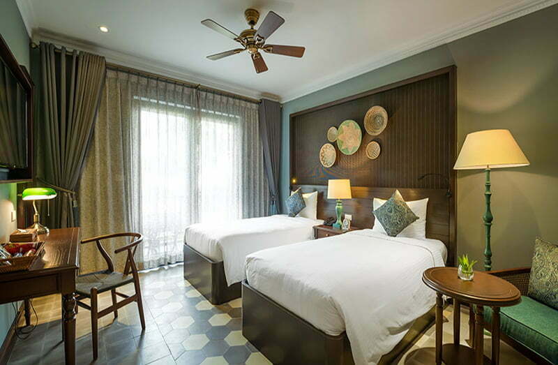 Aira Boutique Deluxe Room with a fan and 2 beds