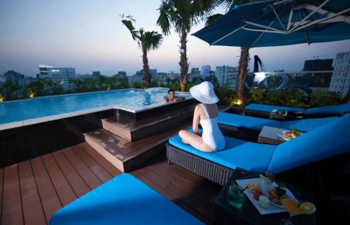 Alagon City Hotel Pool With a Guest on a Sunbed