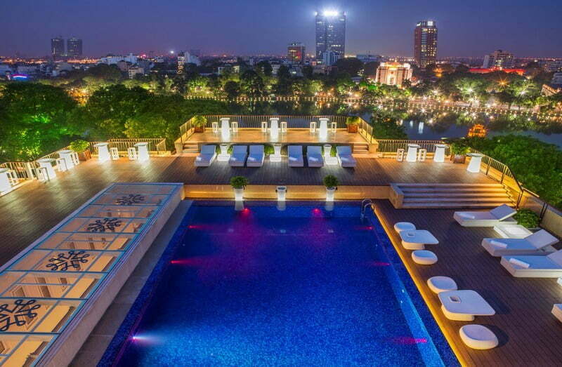Apricot Hotel Rooftop Pool with a Bar At Night