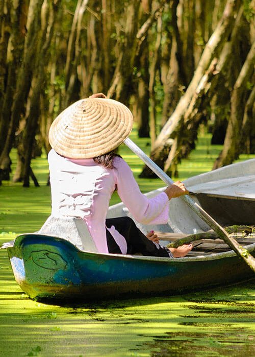 Rowing through the Tra Su forest in the Mekong Delta