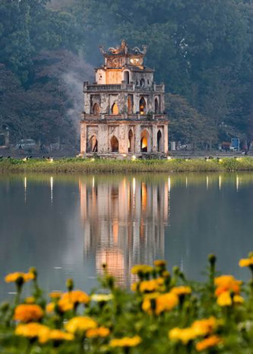 Image of the iconic Turtle Tower perched on Hoan Kiem Lake