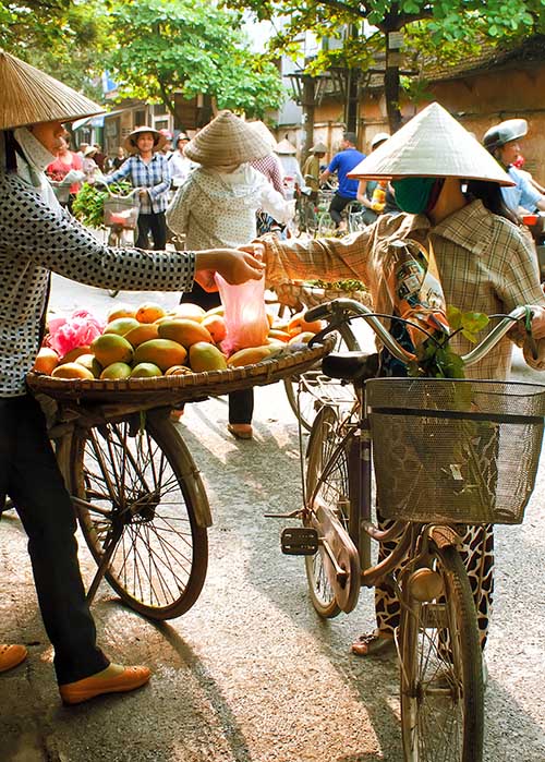 Street vendor selling goods on the streets of Hanoi